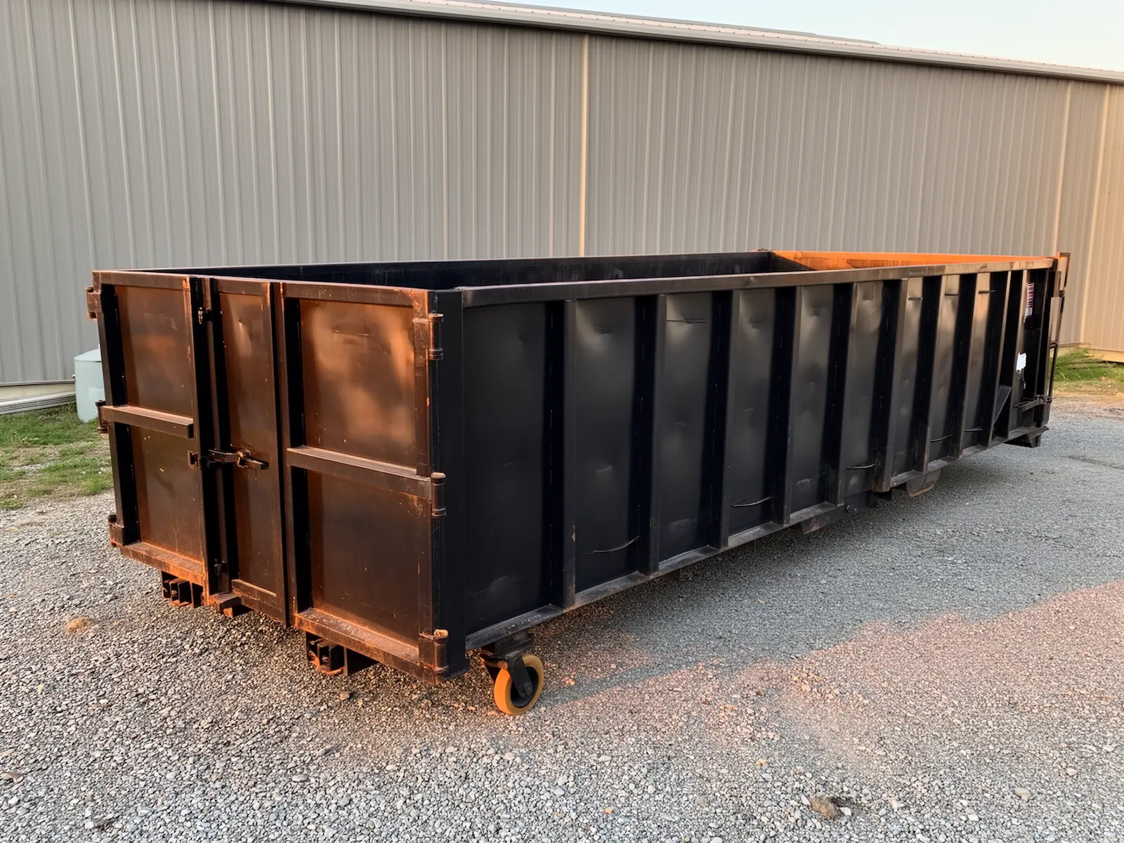 Roll-off dumpster from Slate Point Dumpster Services in Allen Park, MI